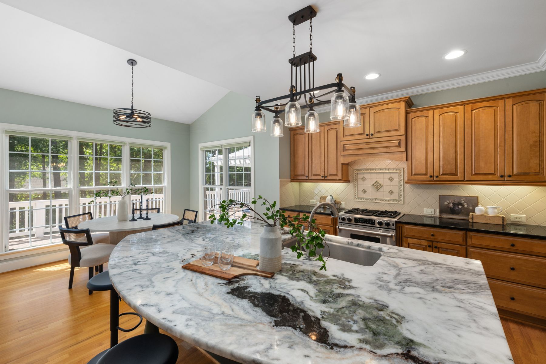 Kitchen with a granite island and pendant lighting